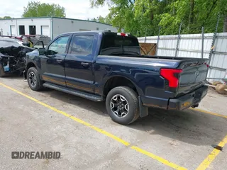 2023 Ford F-150 Lightning Pro with VIN 1FTVW1EL6PWG30061, listed as a IAAI auction lot 42362295 with 22,481 mi miles and . Bid and sale history available at DreamBid. Image 3.