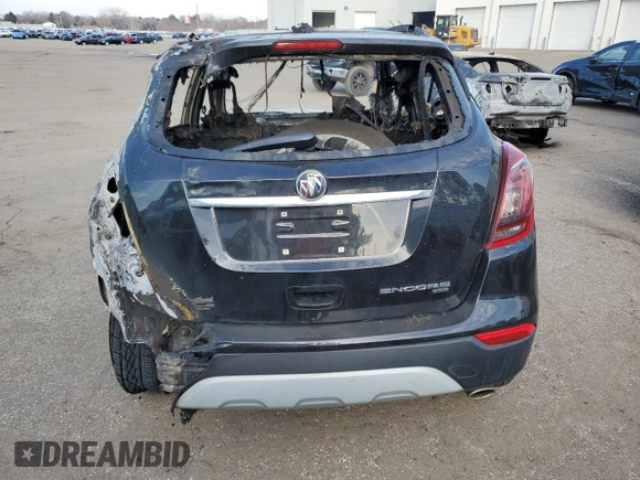 2020 Buick Encore Essence z VIN KL4CJGSB7LB048177, wystawiony jako Copart lot #89152405 z przebiegiem Nie podano mil oraz Nie do naprawy. Historia ofert i sprzedaży dostępna na DreamBid. Obrazek 6.