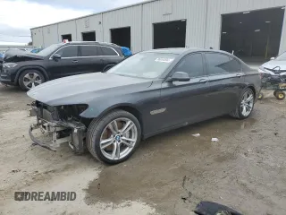 2013 BMW 7 Series 750Li with VIN WBAYE8C57DD133232, listed as a Copart auction lot 86054494 with 118,438 mi miles and Salvage title. Bid and sale history available at DreamBid. Image 1.