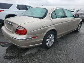 2003 Jaguar S-Type with VIN SAJEA01T93FM49689, listed as a Copart auction lot 43930875 with 303,648 mi miles and Clean Title. Bid and sale history available at DreamBid. Image 3.