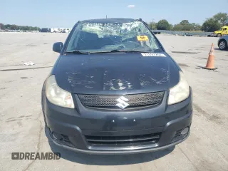 2009 Suzuki SX4 Man FWD with VIN JS2YA413496200847, listed as a Copart auction lot 71297264 with 146,621 mi miles and Salvage Title. Bid and sale history available at carsss.com. Image 5.