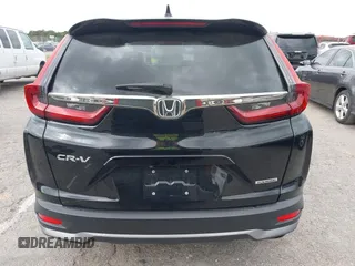 2021 Honda CR-V Touring with VIN 2HKRW1H91MH410751, listed as a IAAI auction lot 41286168 with 56,314 mi miles. Bid and sale history available at carsss.com. Image 16.