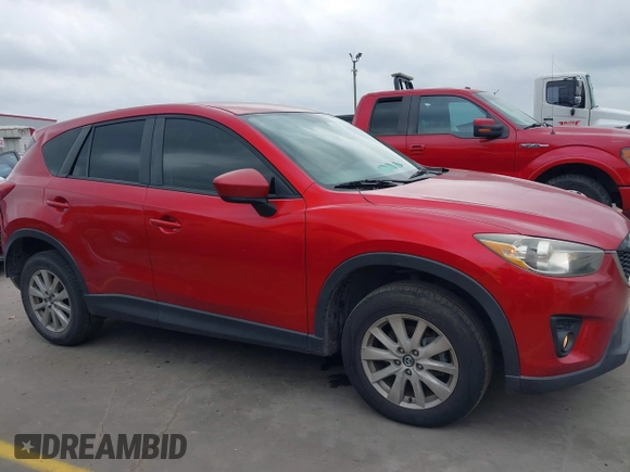 2015 Mazda CX-5 Touring with VIN JM3KE4CYXF0439953, listed as a IAAI auction lot 42124197 with 242,614 mi miles and . Bid and sale history available at DreamBid. Image 13.