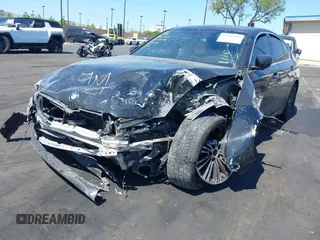 2018 BMW 5 Series 530e with VIN WBAJA9C50JB249995, listed as a IAAI auction lot 42301414 with 179,673 mi miles and . Bid and sale history available at DreamBid. Image 21.