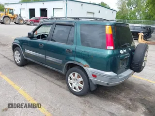 2001 Honda CR-V LX z VIN JHLRD18401C000348, wystawiony jako IAAI lot #42377422 z przebiegiem 238 192 mil mil oraz . Historia ofert i sprzedaży dostępna na DreamBid. Obrazek 3.