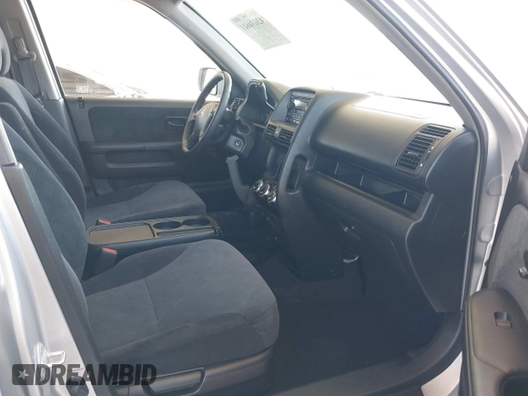 2005 Honda CR-V EX with VIN SHSRD788X5U323021, listed as a IAAI auction lot 42034641 with 154,206 mi miles. Bid and sale history available at carsss.com. Image 5.