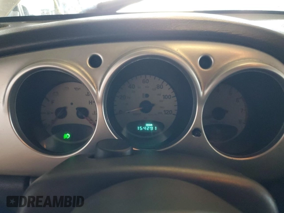 2005 Chrysler PT Cruiser Touring z VIN 3C3EY55E15T285595, wystawiony jako Copart lot #55699955 z przebiegiem 154 291 mil mil oraz Szkoda całkowita • Salvage title. Historia ofert i sprzedaży dostępna na DreamBid. Obrazek 9.
