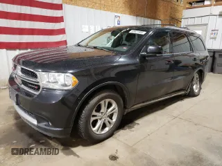 2012 Dodge Durango Crew with VIN 1C4SDJDT0CC323006, listed as a Copart auction lot 63631985 with 126,521 mi miles and Salvage title. Bid and sale history available at DreamBid. Image 1.