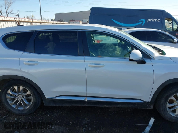 2019 Hyundai Santa Fe SE with VIN 5NMS2CAD2KH020288, listed as a IAAI auction lot 41398304 with 136,693 mi miles and . Bid and sale history available at DreamBid. Image 14.