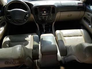2000 Toyota Land Cruiser with VIN JT3HT05J8Y0085990, listed as a Copart auction lot 76706864 with 329,562 mi miles and Salvage Title. Bid and sale history available at carsss.com. Image 8.