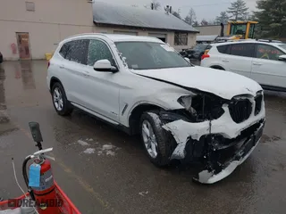 2018 BMW X3 xDrive30i with VIN 5UXTR9C57JLC79852, listed as a IAAI auction lot 40942487 with 87050 miles. Bid and sale history available at carsss.com. Image 1.
