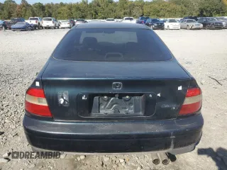 1995 Honda Accord EX with VIN 1HGCD5661SA012246, listed as a Copart auction lot 77007384 with 211,546 mi miles and Salvage Title. Bid and sale history available at DreamBid. Image 6.