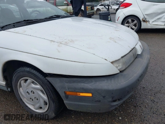 1997 Saturn SL with VIN 1G8ZF5283VZ400170, listed as a IAAI auction lot 41884490 with 171,635 mi miles. Bid and sale history available at carsss.com. Image 6.