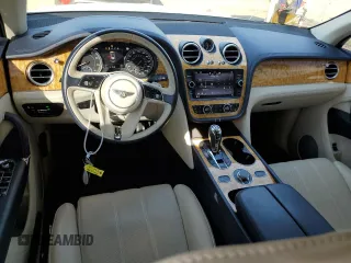 2019 Bentley Bentayga V8 z VIN SJAAM2ZV9KC026988, wystawiony jako Copart lot #73576964 z przebiegiem 31 162 mil mil oraz Szkoda całkowita • Salvage title. Historia ofert i sprzedaży dostępna na DreamBid. Obrazek 8.