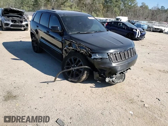 2018 Jeep Grand Cherokee Altitude with VIN 1C4RJFAGXJC388535, listed as a Copart auction lot 89369595 with 127,531 mi miles and Salvage title. Bid and sale history available at DreamBid. Image 12.