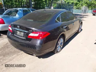 2011 Infiniti M with VIN JN1BY1APXBM324672, listed as a IAAI auction lot 42214163 with 187,424 mi miles. Bid and sale history available at carsss.com. Image 4.