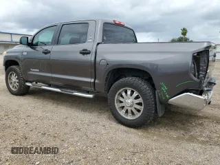 2014 Toyota Tundra 4WD Truck SR5 with VIN 5TFDW5F17EX334666, listed as a Copart auction lot 70492494 with 159,199 mi miles and Salvage Title. Bid and sale history available at carsss.com. Image 2.