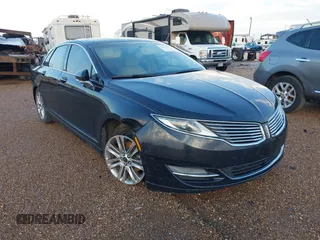 2014 Lincoln MKZ z VIN 3LN6L2G90ER801385, wystawiony jako IAAI lot #41815173 z przebiegiem 155 579 mil mil oraz . Historia ofert i sprzedaży dostępna na DreamBid. Obrazek 1.