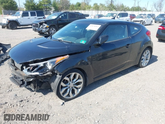 2013 Hyundai Veloster w/Gray Int with VIN KMHTC6AD4DU131242, listed as a IAAI auction lot 42074517 with 76,713 mi miles and . Bid and sale history available at DreamBid. Image 17.