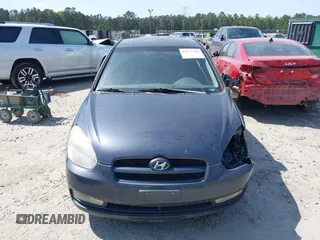 2007 Hyundai Accent SE z VIN KMHCN36C27U050012, wystawiony jako IAAI lot #42112316 z przebiegiem 172 070 mil mil oraz . Historia ofert i sprzedaży dostępna na DreamBid. Obrazek 12.