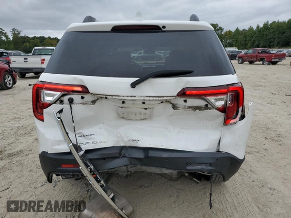 2020 GMC Acadia SLT with VIN 1GKKNML44LZ202439, listed as a Copart auction lot 71468084 with 100,574 mi miles and Salvage Title. Bid and sale history available at DreamBid. Image 6.