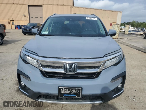 2022 Honda Pilot Touring 7-Passenger z VIN 5FNYF5H69NB031540, wystawiony jako Copart lot #51661185 z przebiegiem 58 316 mil mil oraz Szkoda całkowita • Salvage title. Historia ofert i sprzedaży dostępna na DreamBid. Obrazek 5.