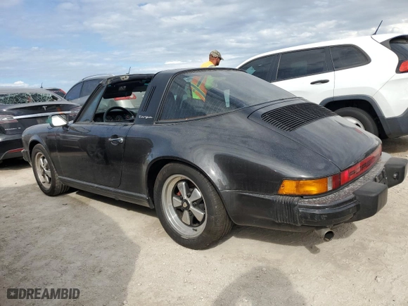 1986 Porsche 911 with VIN WP0EB0916GS161690, listed as a Copart auction lot 74349144 with 119,205 mi miles and Salvage Title. Bid and sale history available at carsss.com. Image 2.