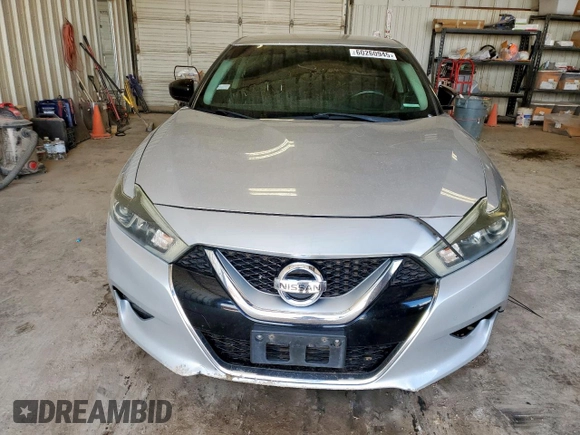 2016 Nissan Maxima Platinum z VIN 1N4AA6AP7GC440845, wystawiony jako Copart lot #60260945 z przebiegiem 129 669 mil mil oraz Szkoda całkowita • Salvage title. Historia ofert i sprzedaży dostępna na DreamBid. Obrazek 5.