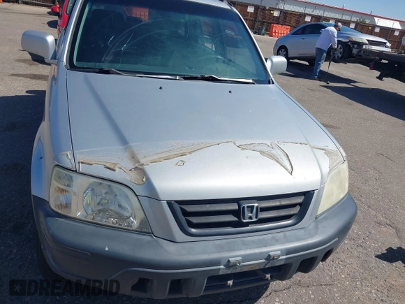 1999 Honda CR-V EX with VIN JHLRD1860XC056641, listed as a IAAI auction lot 42018329 with 321,707 mi miles. Bid and sale history available at carsss.com. Image 6.