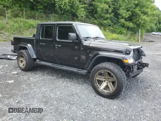 2021 Jeep Gladiator Sport S with VIN 1C6JJTAG4ML583148, listed as a Copart auction lot 59790835 with 48,623 mi miles and Salvage title. Bid and sale history available at DreamBid. Image 4.