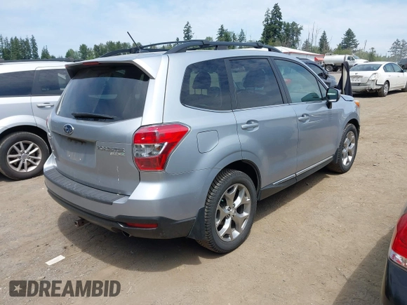 2015 Subaru Forester Touring with VIN JF2SJAWC6FH546472, listed as a IAAI auction lot 42513843 with 107,951 mi miles and . Bid and sale history available at DreamBid. Image 4.