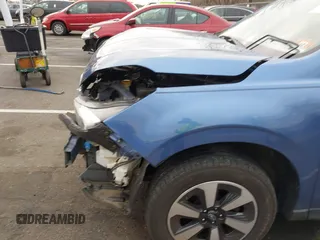 2018 Subaru Forester z VIN JF2SJABC7JH472767, wystawiony jako IAAI lot #40918955 z przebiegiem 72 592 mil mil oraz . Historia ofert i sprzedaży dostępna na DreamBid. Obrazek 6.