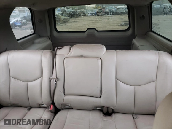 2003 GMC Yukon SLE with VIN 1GKEK13T43R205384, listed as a Copart auction lot 76916664 with 258,551 mi miles and Salvage Title. Bid and sale history available at carsss.com. Image 10.