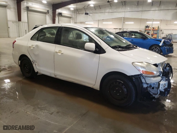 2011 Toyota Yaris with VIN JTDBT4K30B1405853, listed as a Copart auction lot 53512555 with 210,769 mi miles and Clean Title. Bid and sale history available at carsss.com. Image 4.