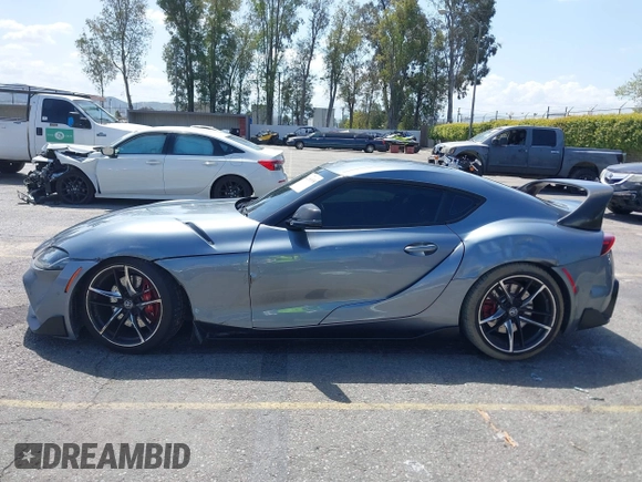 2022 Toyota Supra 3.0 z VIN WZ1DB0C03NW050498, wystawiony jako IAAI lot #41950538 z przebiegiem 42 449 mil mil oraz . Historia ofert i sprzedaży dostępna na DreamBid. Obrazek 14.