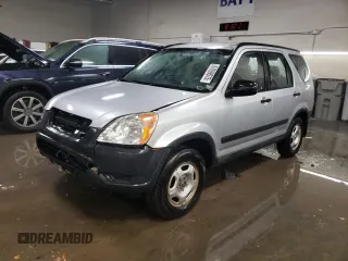 2002 Honda CR-V LX with VIN JHLRD68512C009941, listed as a Copart auction lot 87699075 with 133,311 mi miles and Salvage Title. Bid and sale history available at DreamBid. Image 1.