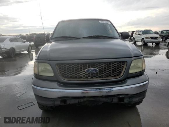 2003 Ford F-150 XL z VIN 1FTRF17263NA29013, wystawiony jako Copart lot #55668355 z przebiegiem 202 416 mil mil oraz Szkoda całkowita • Salvage title. Historia ofert i sprzedaży dostępna na DreamBid. Obrazek 5.
