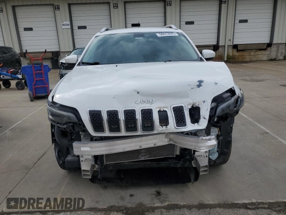 2019 Jeep Cherokee Limited with VIN 1C4PJMDX2KD409798, listed as a Copart auction lot 56913685 with 59,299 mi miles and Salvage title. Bid and sale history available at DreamBid. Image 5.