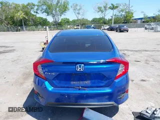 2018 Honda Civic LX with VIN 19XFC2F54JE027744, listed as a IAAI auction lot 42038398 with 119,250 mi miles and . Bid and sale history available at DreamBid. Image 16.