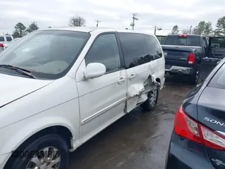 2004 Kia Sedona LX with VIN KNDUP131446537660, listed as a IAAI auction lot 41526183 with 282,891 mi miles. Bid and sale history available at carsss.com. Image 6.