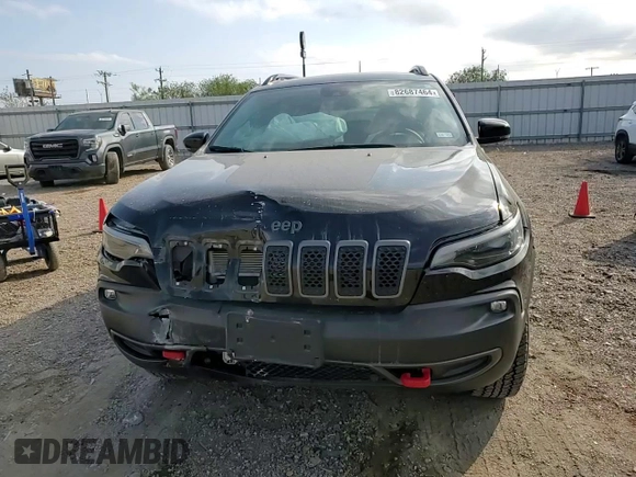 2022 Jeep Cherokee Trailhawk with VIN 1C4PJMBX8ND554044, listed as a Copart auction lot 82687464 with 13,353 mi miles and Salvage Title. Bid and sale history available at carsss.com. Image 11.