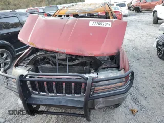 2002 Jeep Grand Cherokee z VIN 1J8GW38S72C159886, wystawiony jako Copart lot #77765704 z przebiegiem Nie podano mil oraz Szkoda całkowita • Salvage title. Historia ofert i sprzedaży dostępna na DreamBid. Obrazek 5.