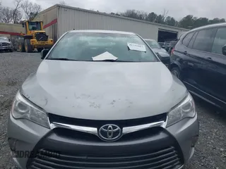 2015 Toyota Camry XLE with VIN 4T1BF1FKXFU955780, listed as a IAAI auction lot 41731667 with 210,750 mi miles and . Bid and sale history available at DreamBid. Image 12.