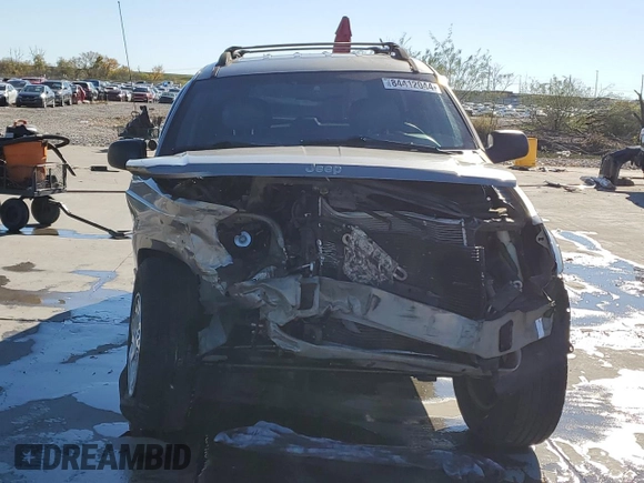 1999 Jeep Grand Cherokee Laredo with VIN 1J4GW58NXXC776438, listed as a Copart auction lot 84412044 with 163,060 mi miles and Salvage title. Bid and sale history available at DreamBid. Image 5.