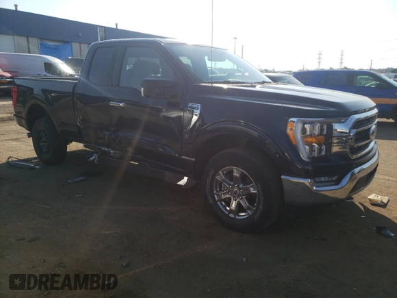 2021 Ford F-150 XL with VIN 1FTFX1E88MKD05444, listed as a Copart auction lot 71669704 with 35,779 mi miles and Salvage title. Bid and sale history available at DreamBid. Image 4.