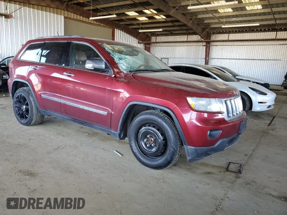 2013 Jeep Grand Cherokee Overland with VIN 1C4RJECT6DC526743, listed as a Copart auction lot 50203065 with 186,673 mi miles and Salvage Title. Bid and sale history available at DreamBid. Image 4.
