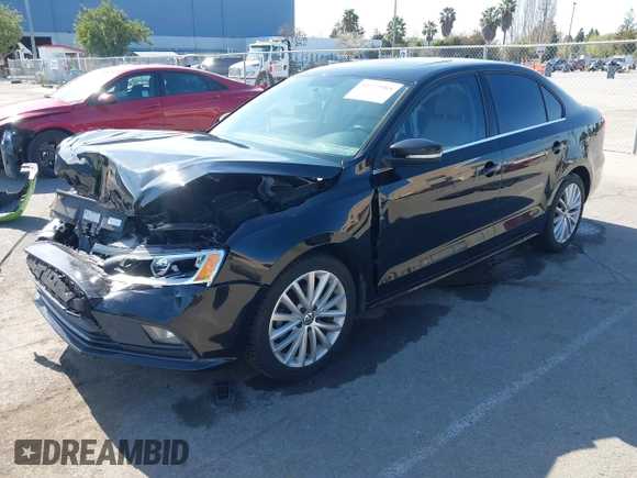2015 Volkswagen Jetta Sedan 1.8T SE w/Connectivity with VIN 3VWD07AJ6FM354397, listed as a IAAI auction lot 41772983 with 100,265 mi miles. Bid and sale history available at carsss.com. Image 2.