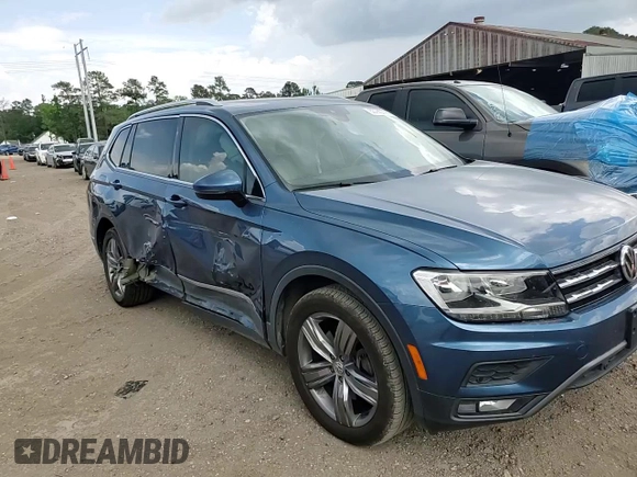 2020 Volkswagen Tiguan SE z VIN 3VV3B7AXXLM124257, wystawiony jako Copart lot #53740795 z przebiegiem 63 455 mil mil oraz Szkoda całkowita • Salvage title. Historia ofert i sprzedaży dostępna na DreamBid. Obrazek 14.