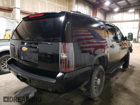 2013 Chevrolet Suburban with VIN 1GNWK5EG4DR246825, listed as a Copart auction lot 56764205 with 162,459 mi miles and Salvage title. Bid and sale history available at DreamBid. Image 3.