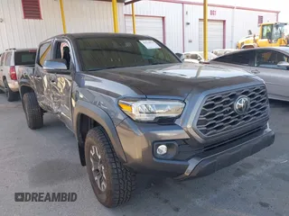 2022 Toyota Tacoma SR with VIN 3TMCZ5AN5NM494936, listed as a IAAI auction lot 42514975 with 33,551 mi miles and . Bid and sale history available at DreamBid. Image 1.